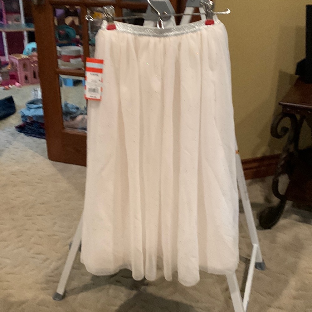 Cream colored tulle skirt with sparkles